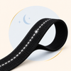 Black reflective webbing with evening visibility details