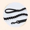 Black bungee leash elastic section with cushioning motion detail